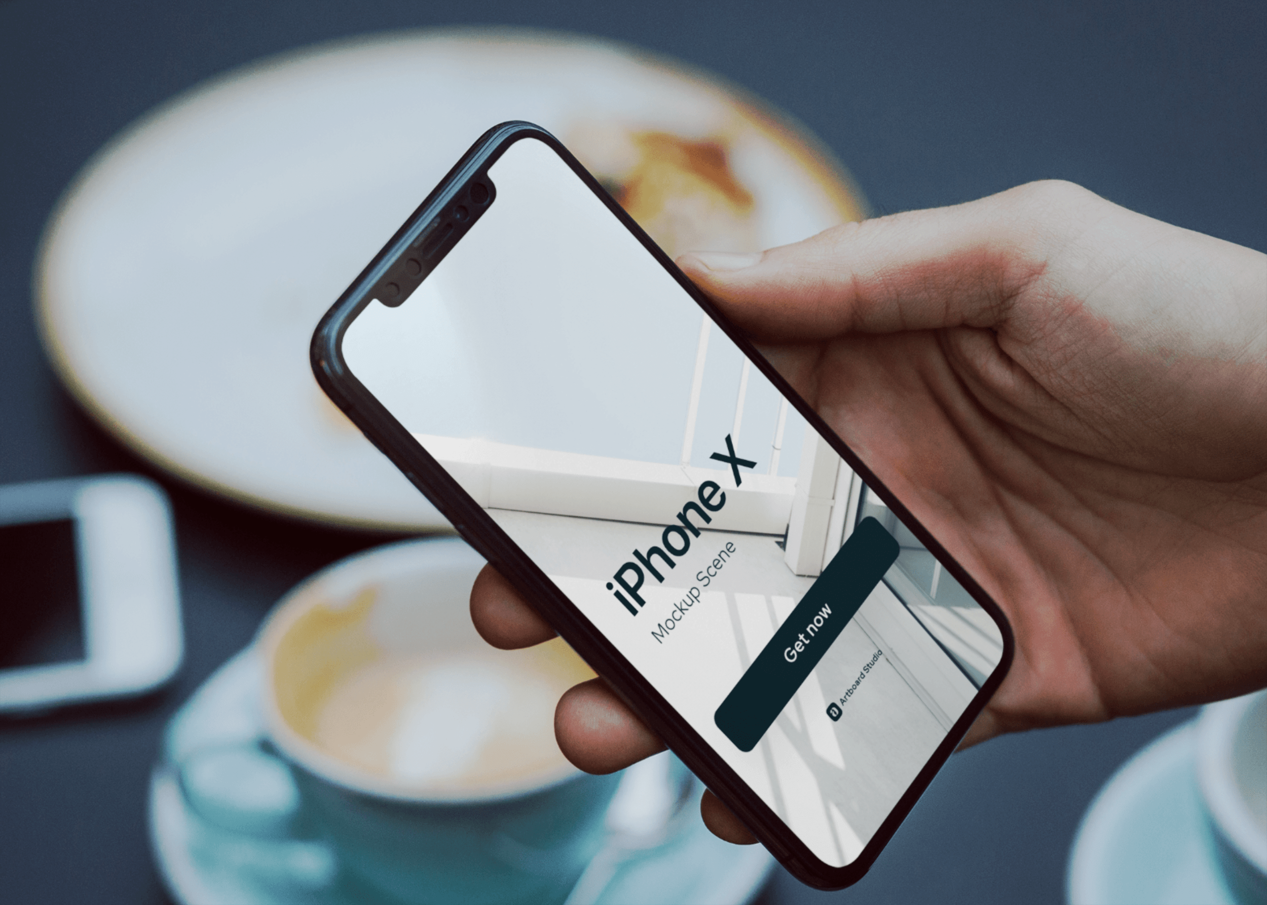 Iphone x mockup which brings a classic display, one that mixes electronic devices, notebooks, flowers, and accessories in an elegant scene. Hand Holding Iphone X Mockup Scene